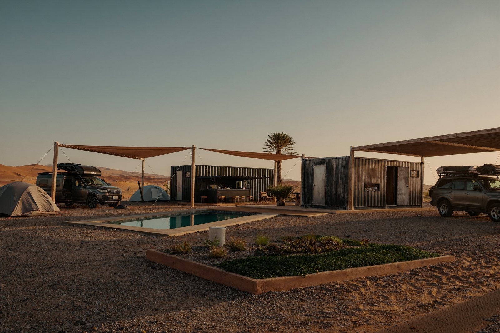 Concept: a simple container-built BYOT basecamp at golden hour